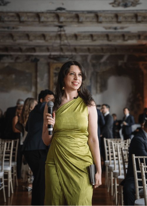 Alana Tran — Melbourne wedding celebrant in green dress at outdoor ceremony