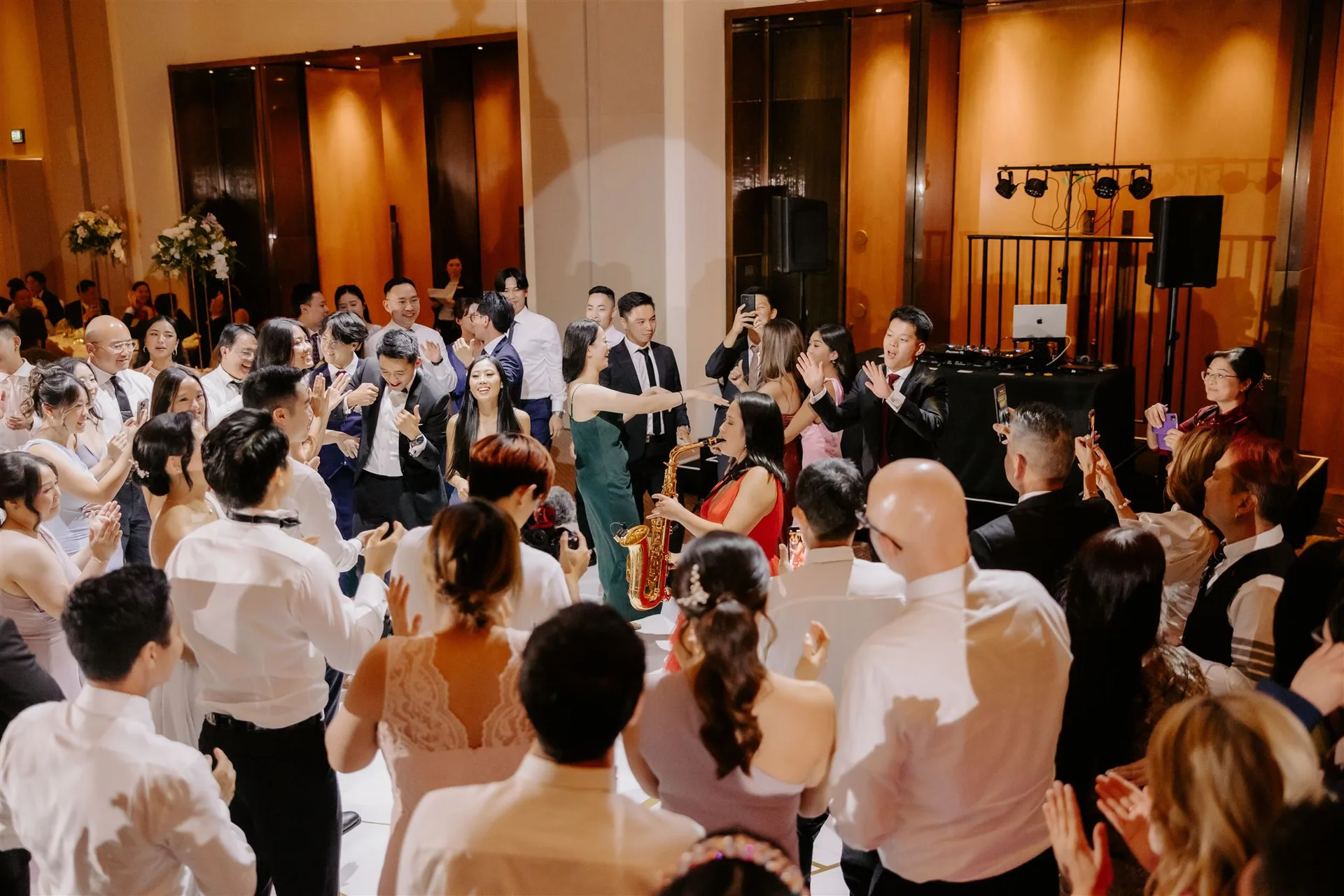 Guests dancing at a Melbourne wedding DJ event by Emily Gracie