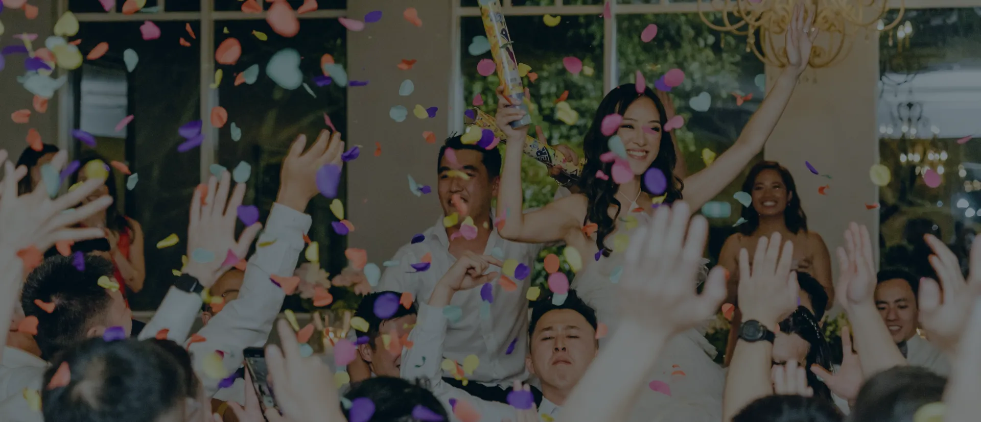 Bride throwing confetti at a packed Melbourne wedding dance floor — DJ Emily Gracie wedding DJ